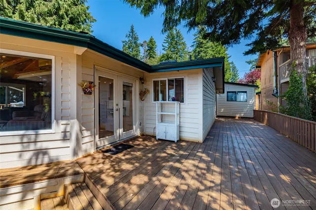 a view of a backyard of the house