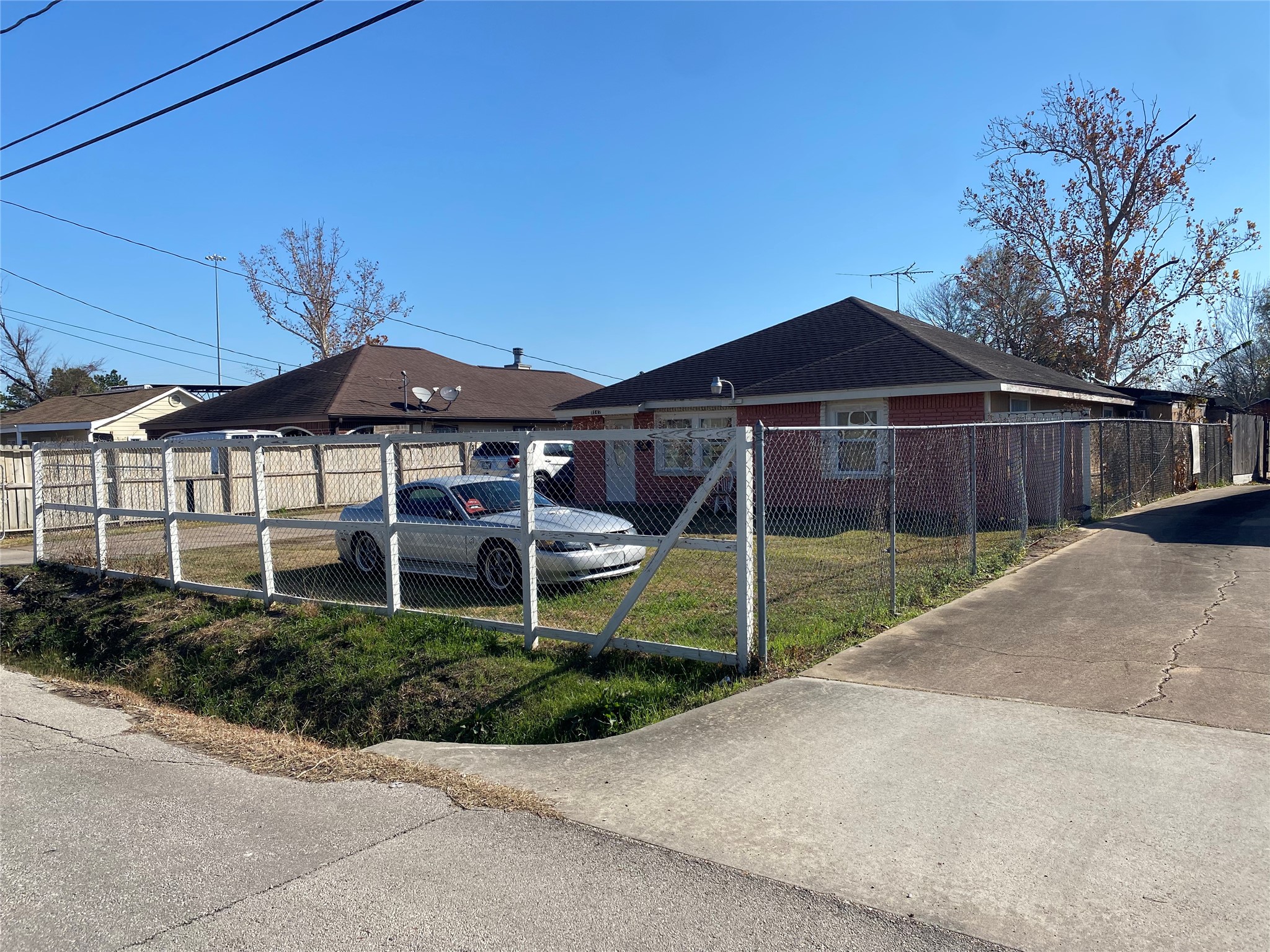 3147 Golfcrest Boulevard Houston, TX 77087 - Photo 2 of 27 a view of a house with wooden fence