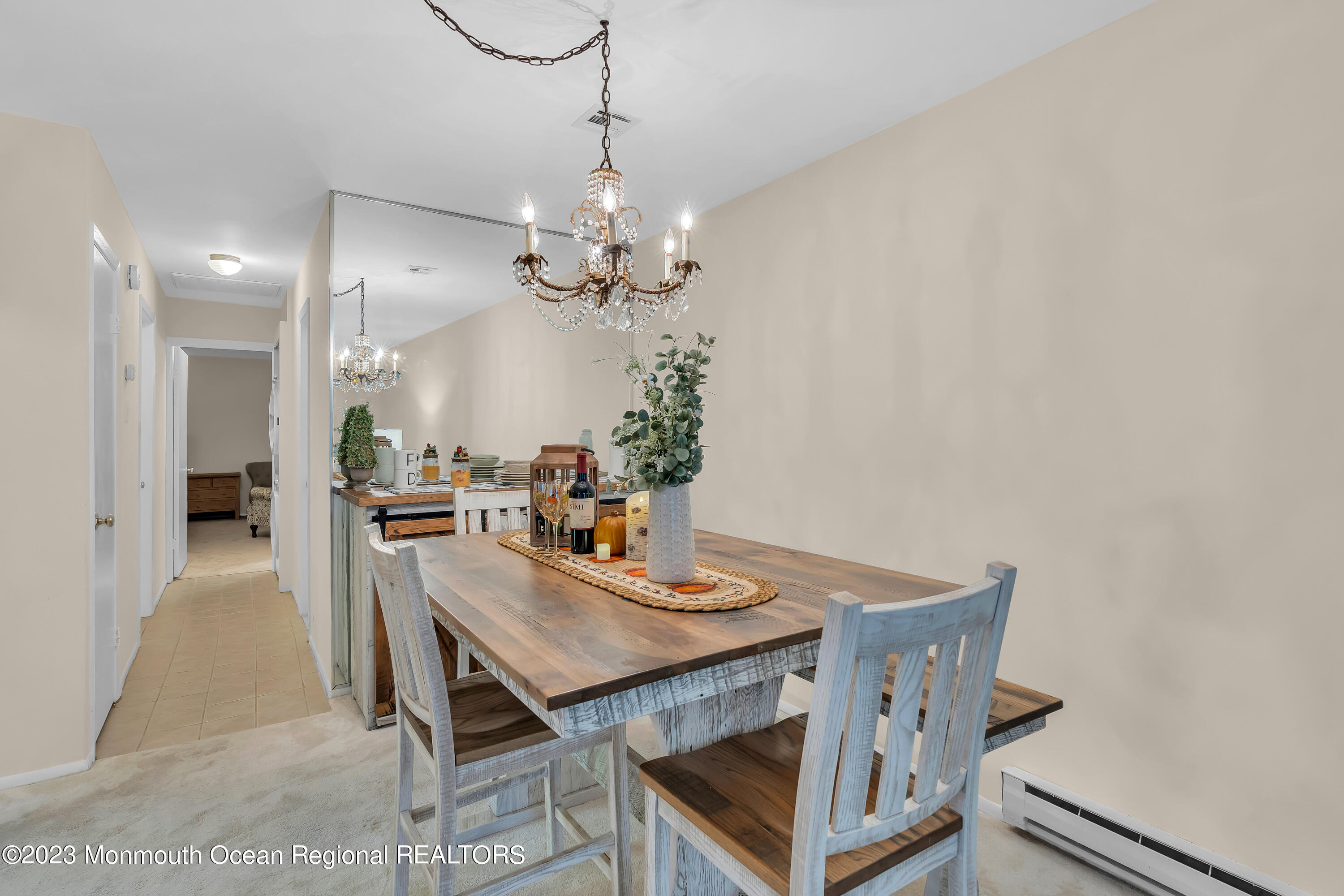 80 Friendship Court Red Bank, NJ 07701 - Photo 11 of 25 a view of a dining room with furniture and wooden floor