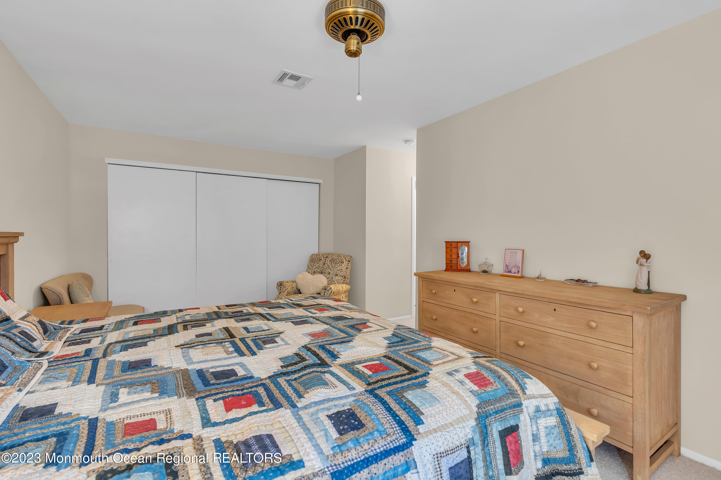 80 Friendship Court Red Bank, NJ 07701 - Photo 16 of 25 a bedroom with a bed and a dresser