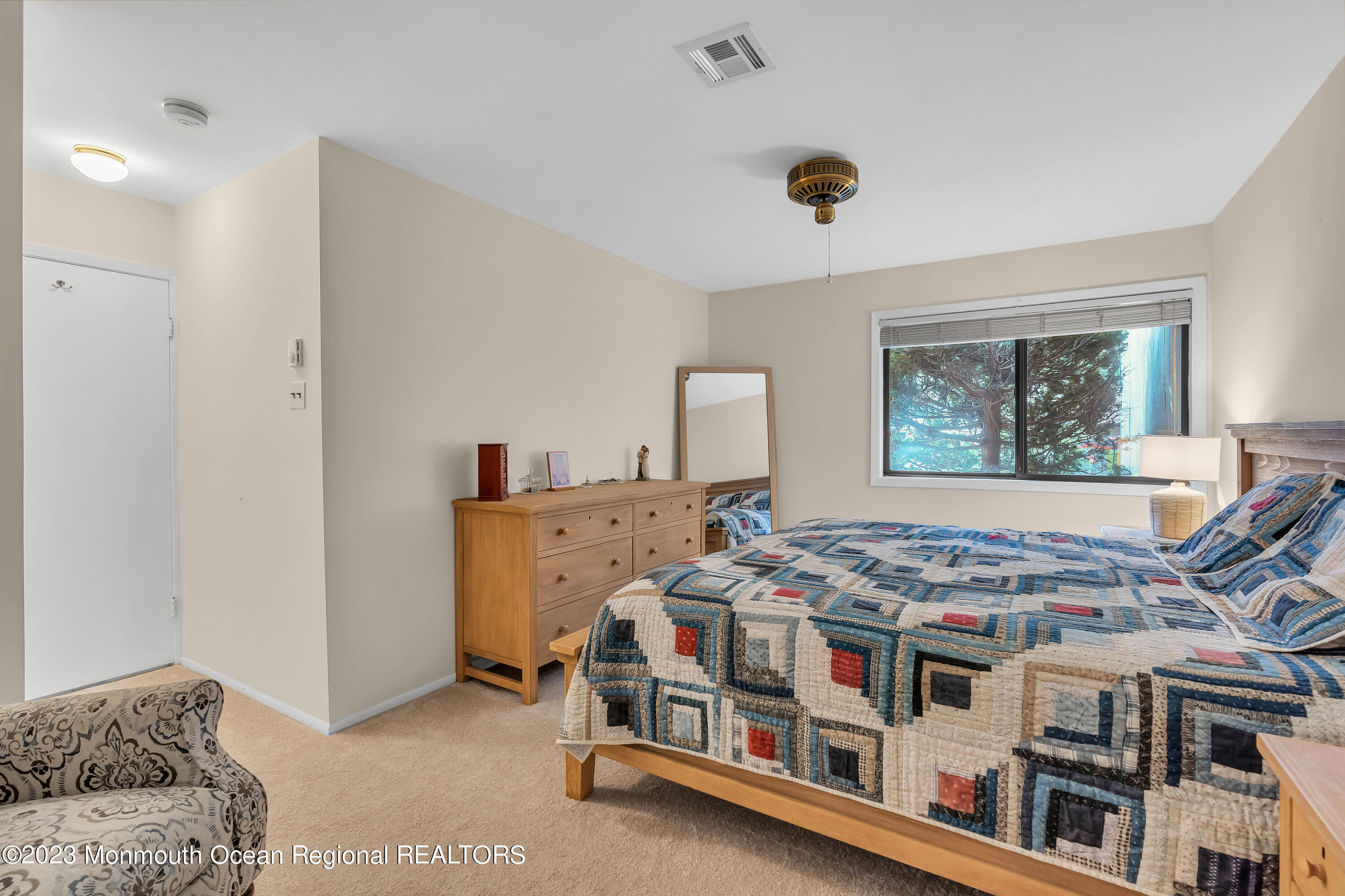 80 Friendship Court Red Bank, NJ 07701 - Photo 17 of 25 a bedroom with furniture and a window