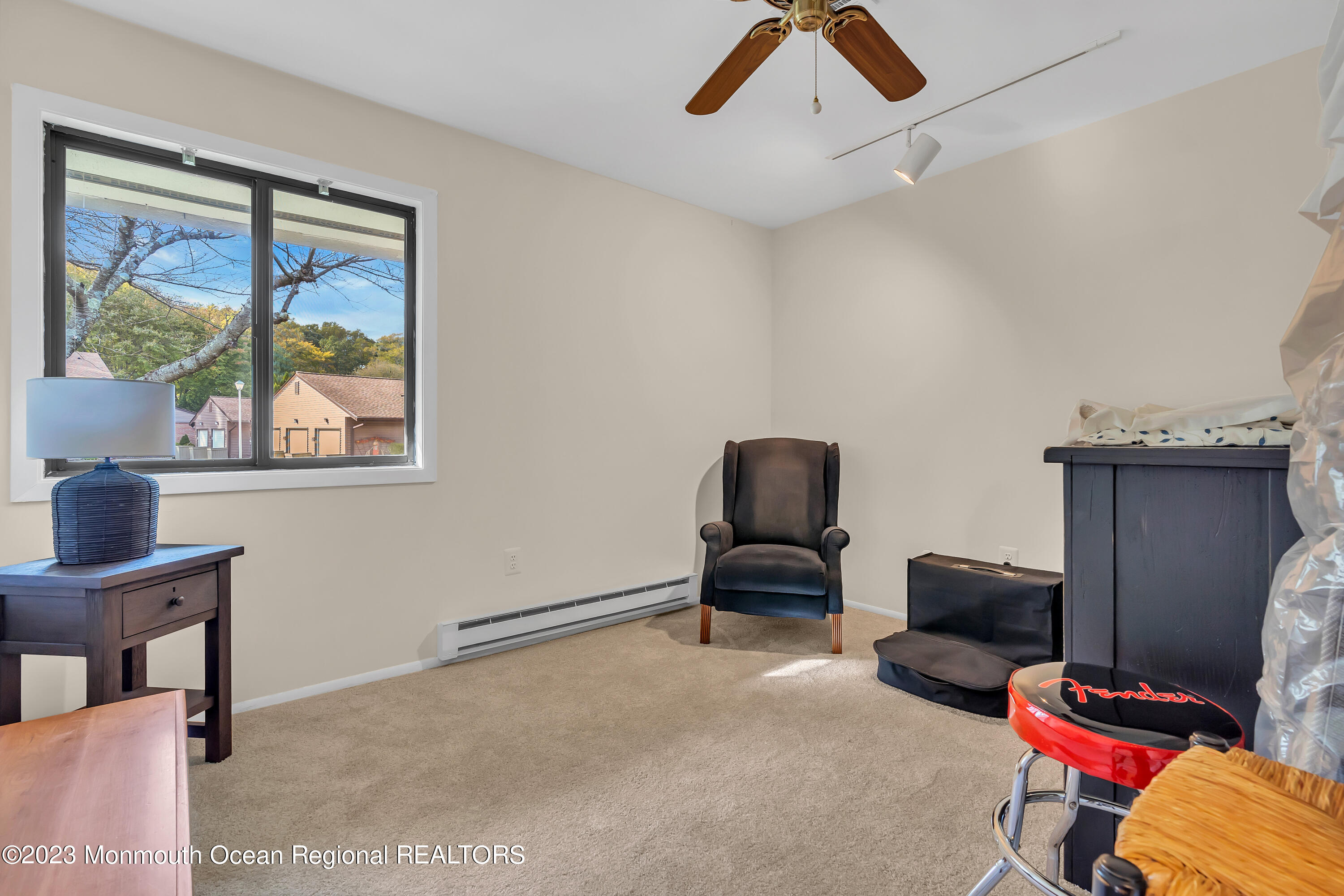 80 Friendship Court Red Bank, NJ 07701 - Photo 20 of 25 a living room with furniture and a window
