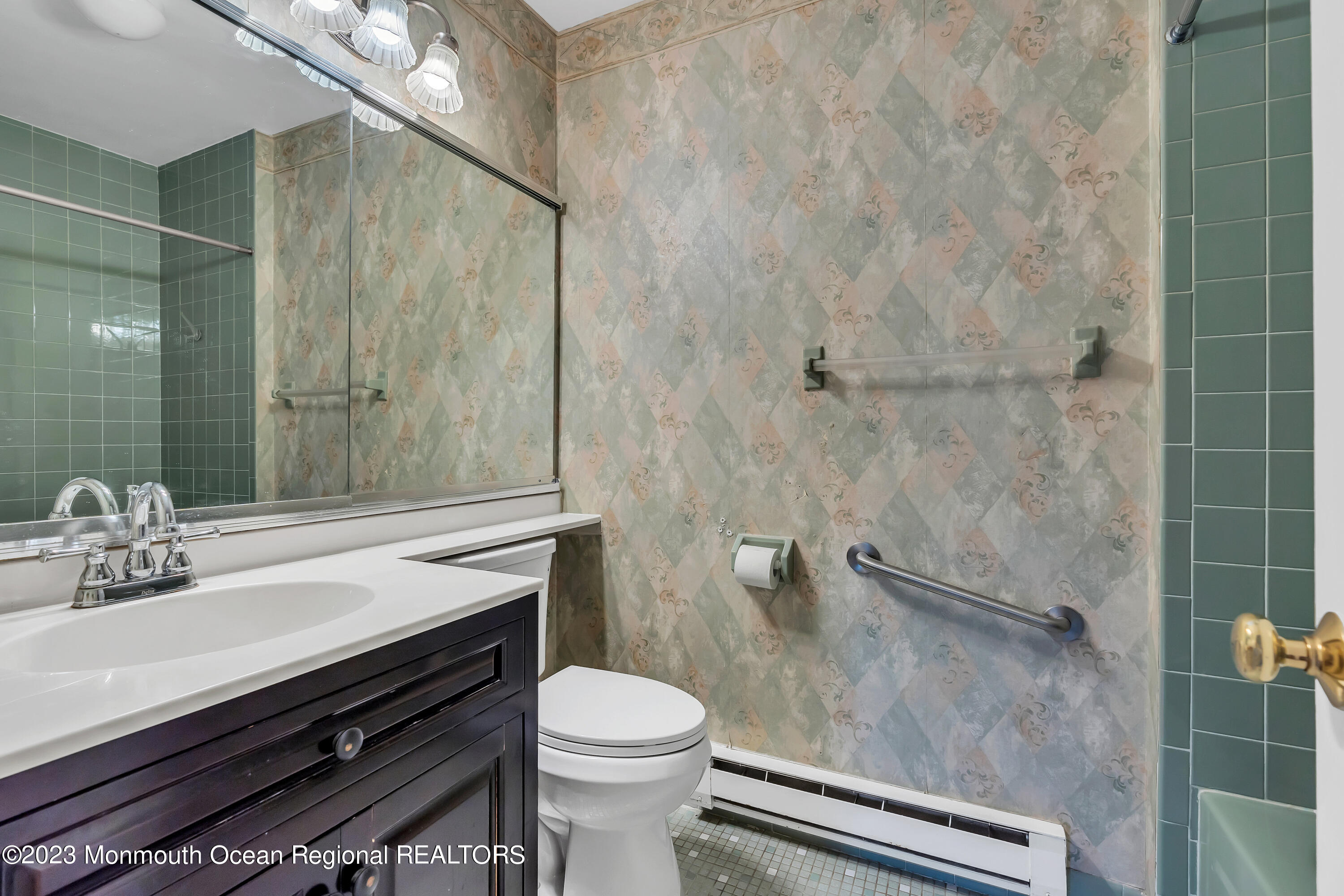 80 Friendship Court Red Bank, NJ 07701 - Photo 21 of 25 a bathroom with a sink a toilet and shower