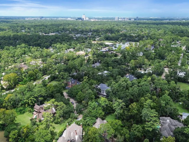 an aerial view of a city with lots of residential buildings