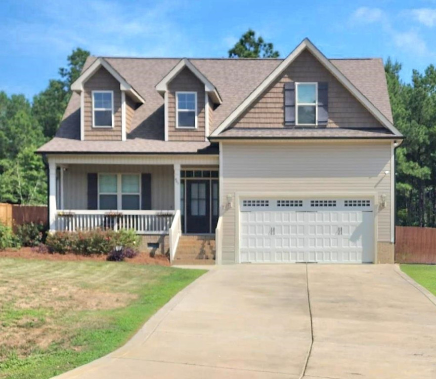465 Redwood Road Zebulon, NC 27597 - Photo 1 of 3 front view of house with a yard