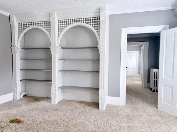 a view of a livingroom with a staircase