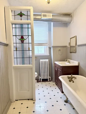 a view of a room with a window
