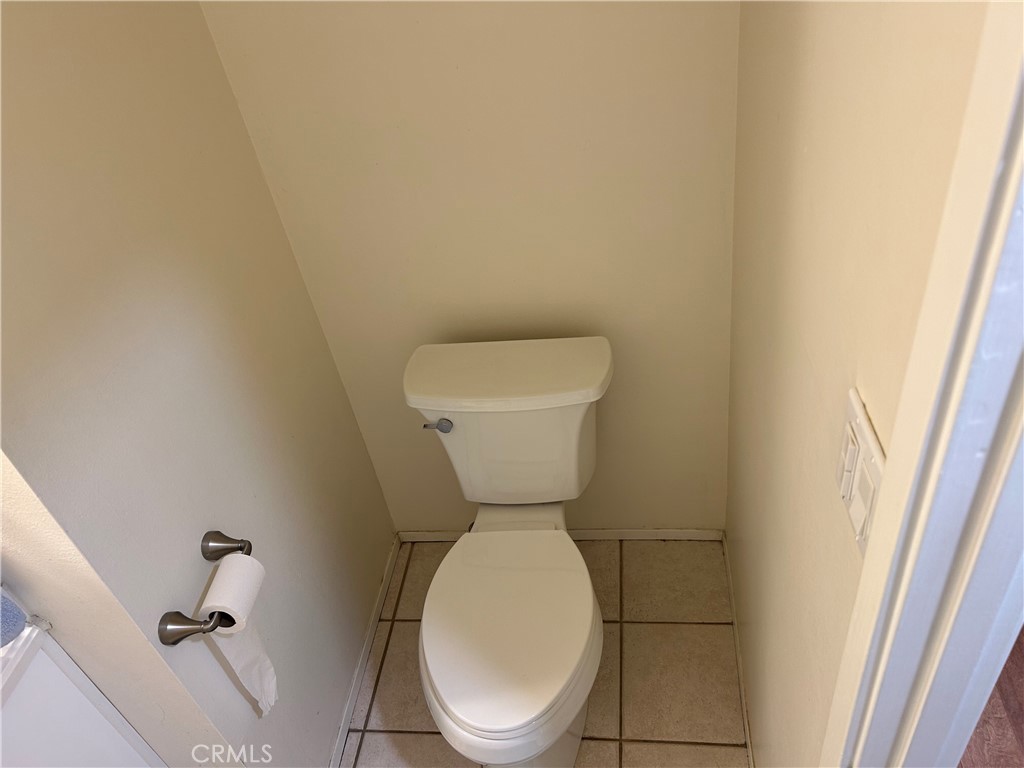 10443 Nate Way Santee, CA 92071 - Photo 14 of 27 a bathroom with a toilet