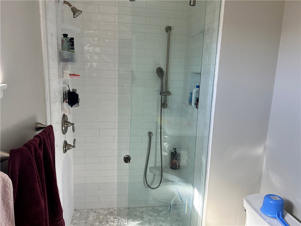 10443 Nate Way Santee, CA 92071 - Photo 16 of 27 a bathroom with a shower