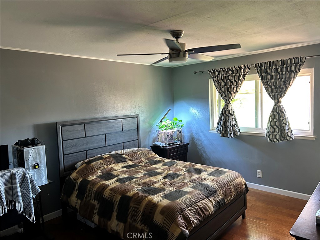 10443 Nate Way Santee, CA 92071 - Photo 7 of 27 a bedroom with a bed and a window