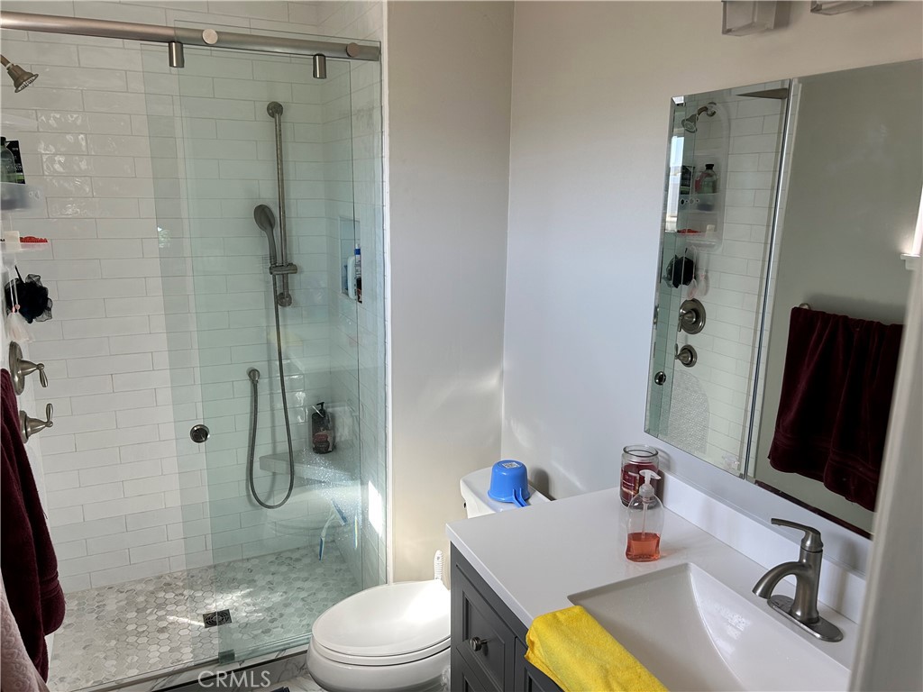 10443 Nate Way Santee, CA 92071 - Photo 8 of 27 a bathroom with a sink toilet and shower