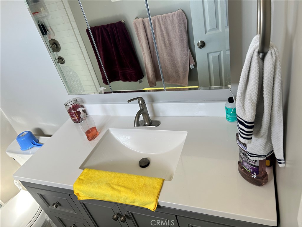 10443 Nate Way Santee, CA 92071 - Photo 9 of 27 a bathroom with a sink and a mirror