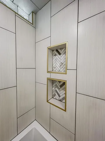 a white refrigerator freezer and a dishwasher with wooden floor
