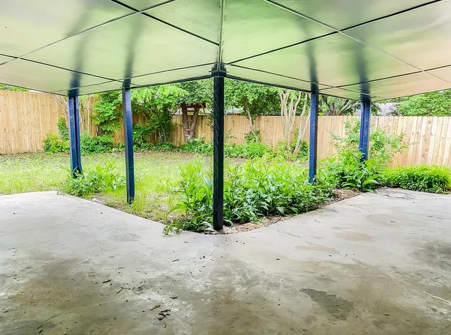 a view of a backyard with garden