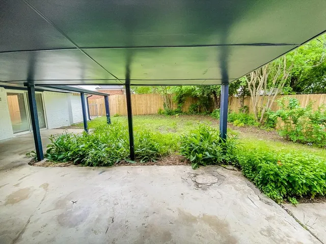 a view of a back yard from a window