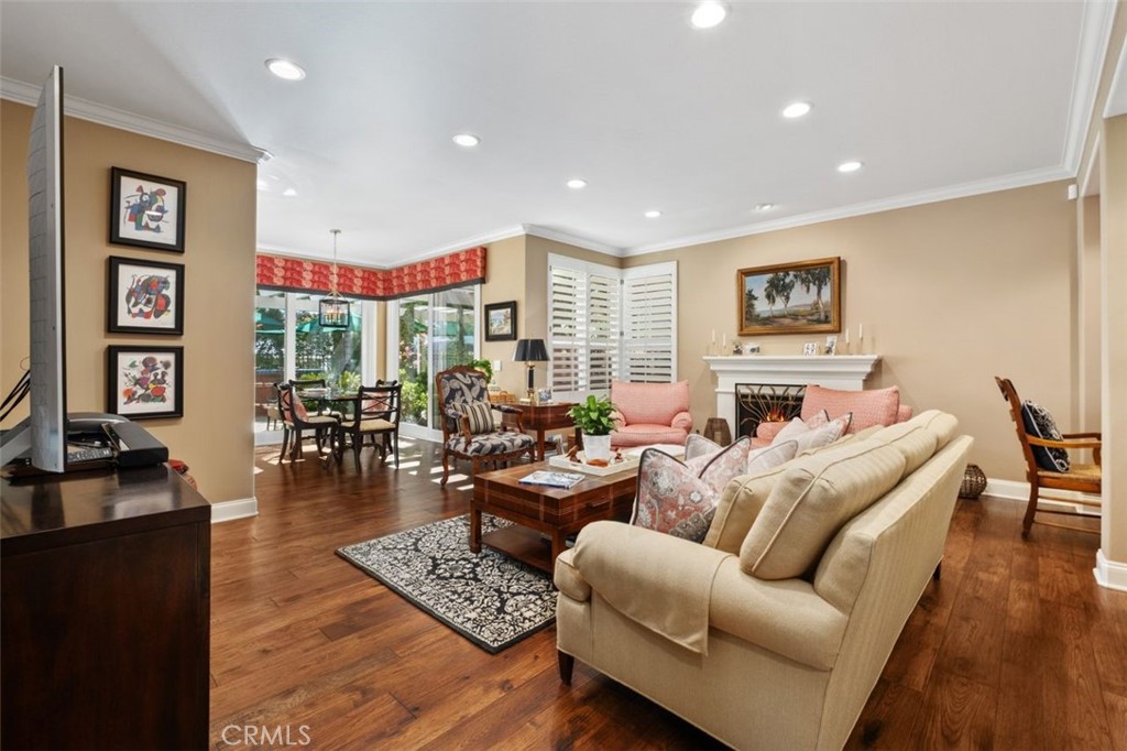 6 Muirfield Rancho Santa Margarita, CA 92679 - Photo 17 of 49 a living room with furniture wooden floor and a flat screen tv