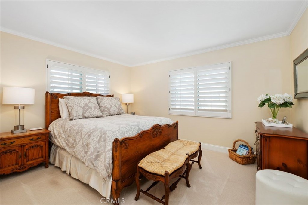 6 Muirfield Rancho Santa Margarita, CA 92679 - Photo 25 of 49 a bedroom with a bed and a window