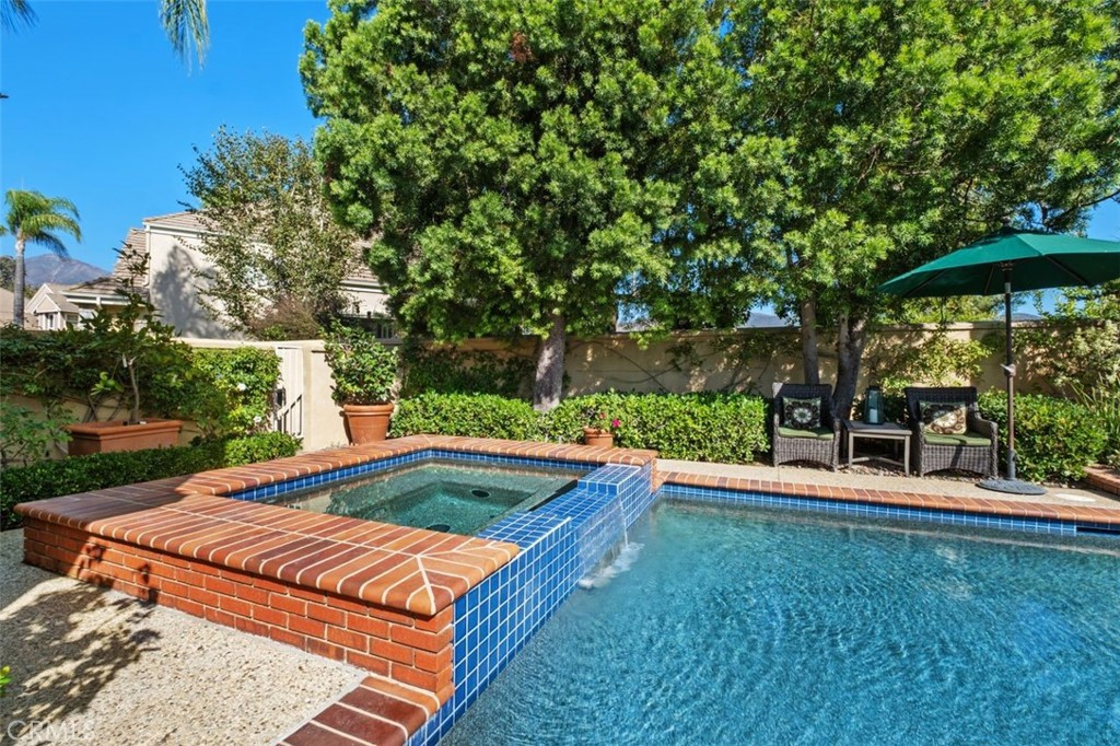 6 Muirfield Rancho Santa Margarita, CA 92679 - Photo 39 of 49 a view of a backyard with sitting area
