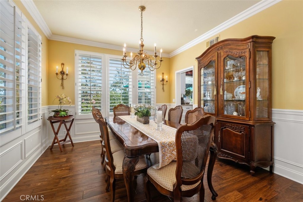 6 Muirfield Rancho Santa Margarita, CA 92679 - Photo 10 of 49 a view of a dining room with furniture window and wooden floor