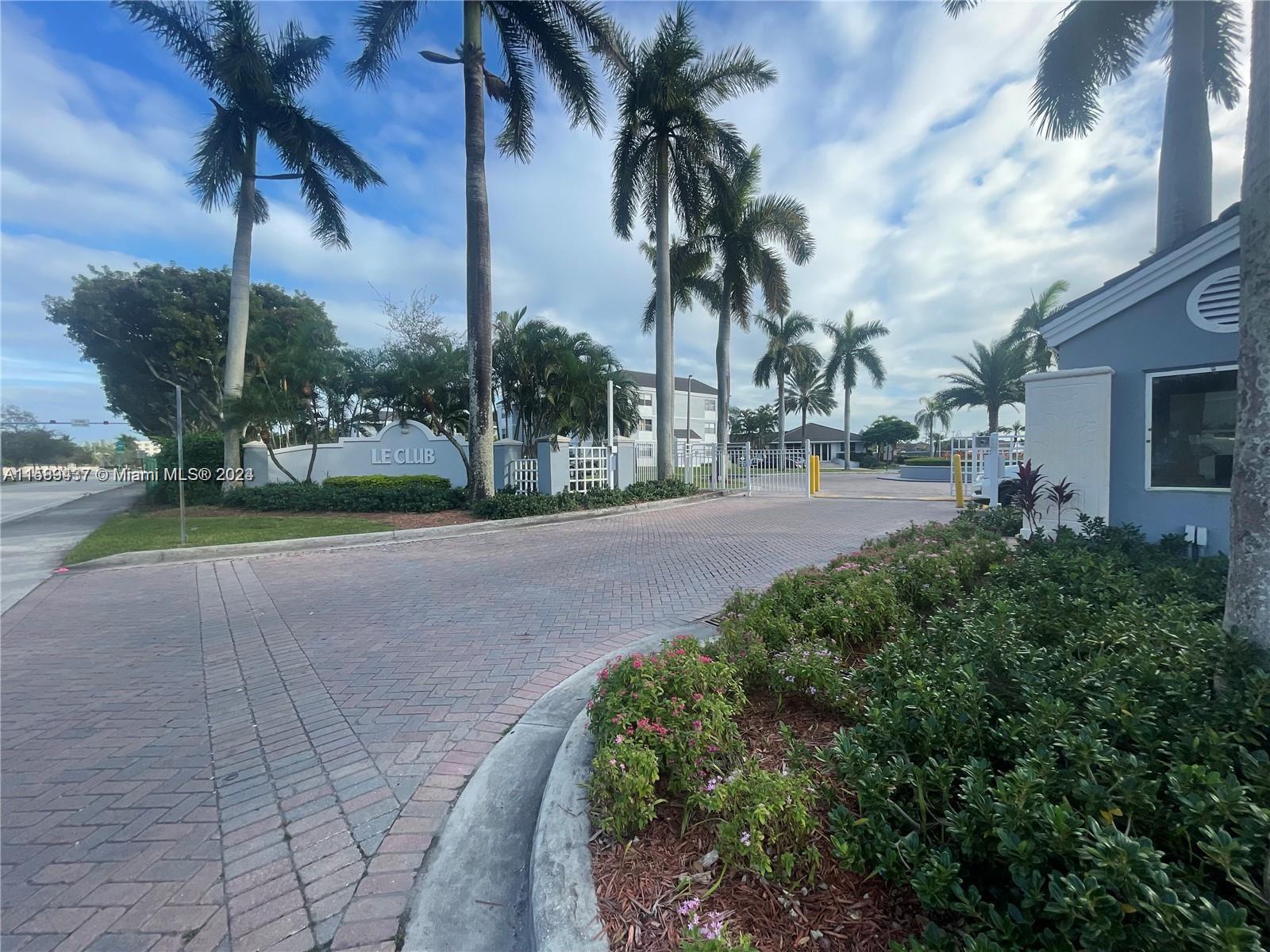 8650 Southwest 212th Street, Unit 101 Cutler Bay, FL 33189 - Photo 5 of 29 a view of a park with palm trees