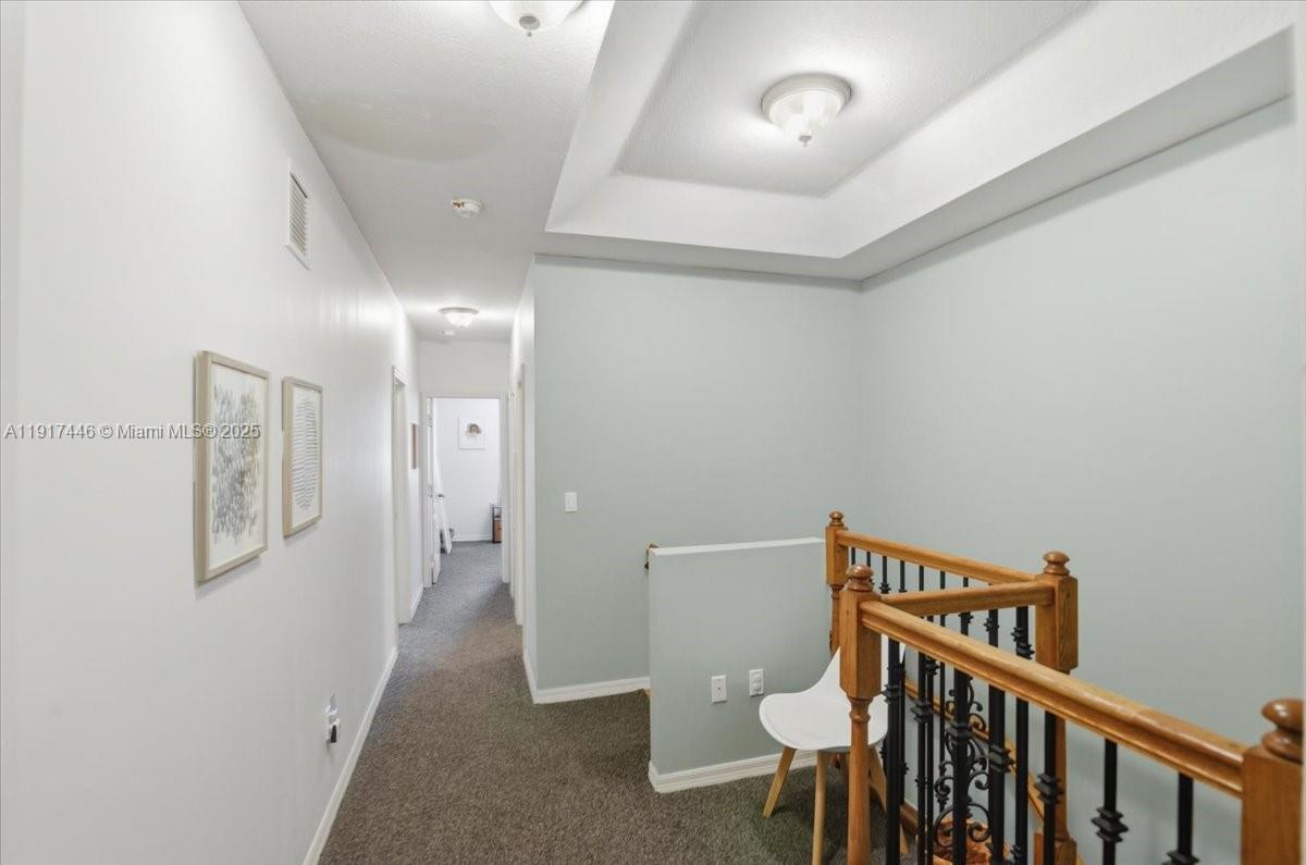 10891 Southwest 88th Terrace Miami, FL 33176 - Photo 18 of 41 a view of a hallway with bathroom