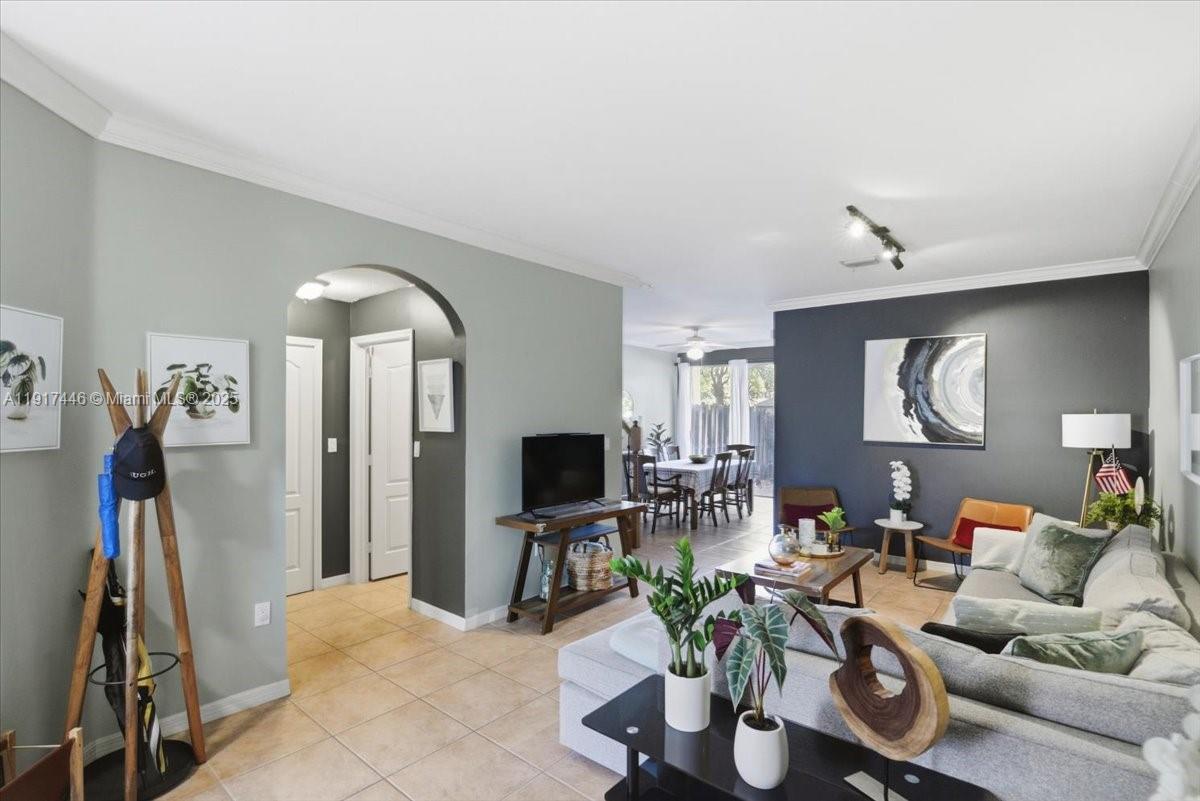10891 Southwest 88th Terrace Miami, FL 33176 - Photo 9 of 41 a living room with furniture and wooden floor