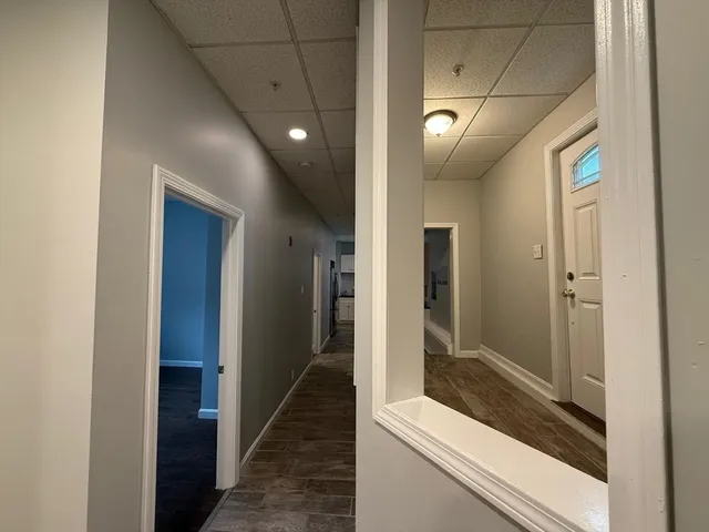 a view of hallway with shower