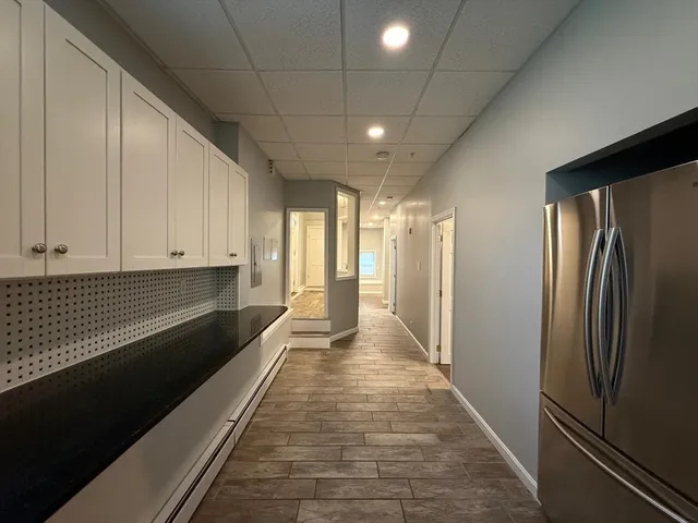 a view of a refrigerator in the kitchen