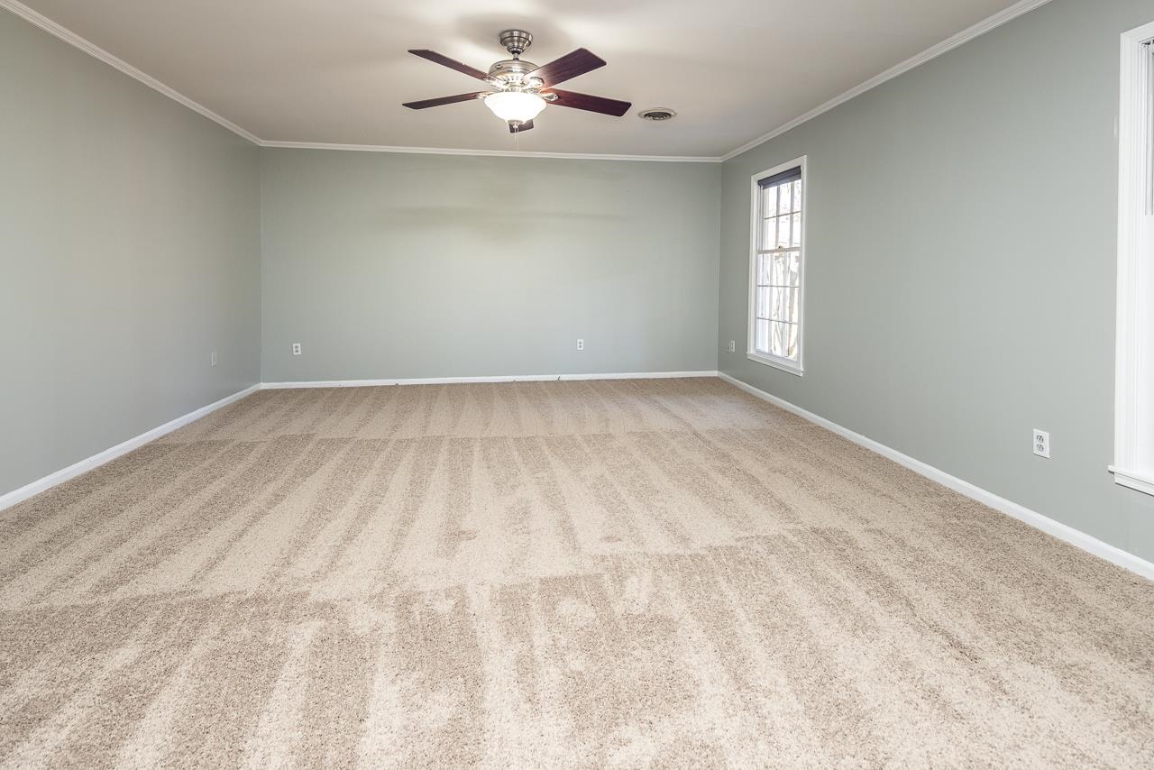 4734 Willow Road Memphis, TN 38117 - Photo 11 of 23 a view of an empty room with a window