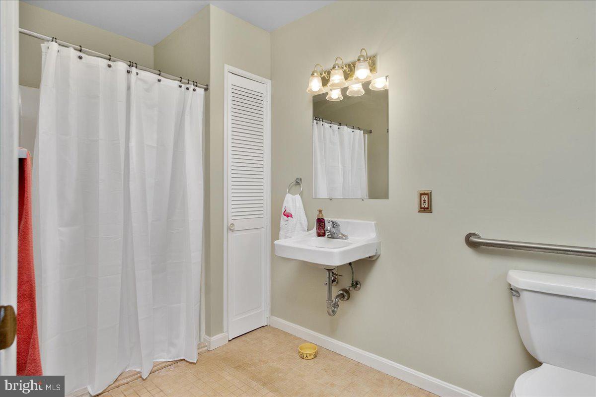 6626 Jefferson Boulevard Frederick, MD 21703 - Photo 22 of 65 Main level full bath with wheel in shower