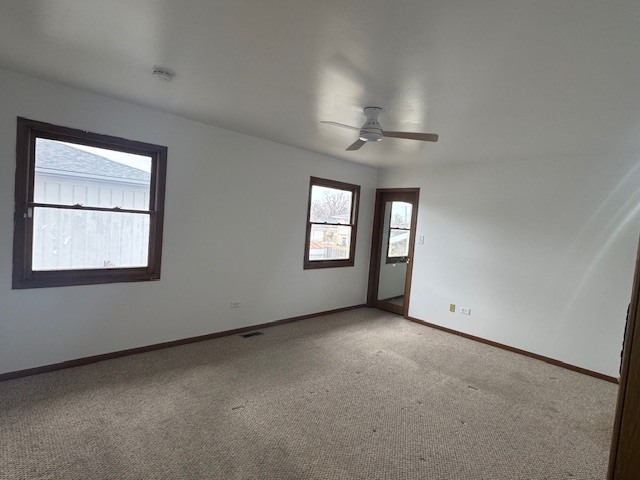 910 East 152nd Place Phoenix, IL 60426 - Photo 15 of 28 an empty room with a window