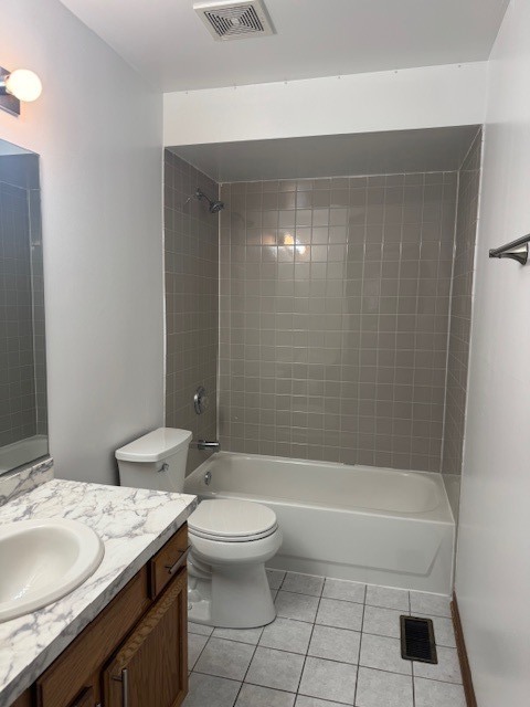 910 East 152nd Place Phoenix, IL 60426 - Photo 20 of 28 a bathroom with a granite countertop sink a toilet and shower