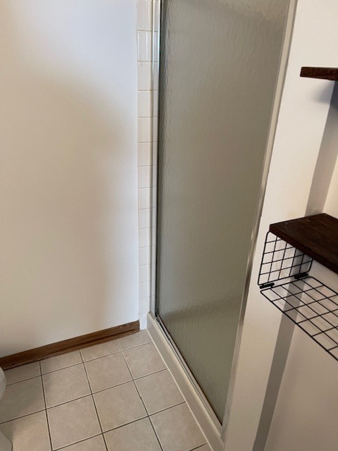 910 East 152nd Place Phoenix, IL 60426 - Photo 24 of 28 a view of an empty room and wooden floor