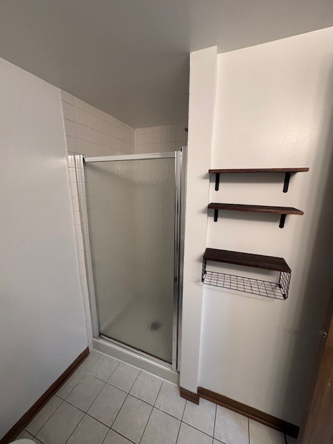 910 East 152nd Place Phoenix, IL 60426 - Photo 26 of 28 a view of walk in closet with empty racks