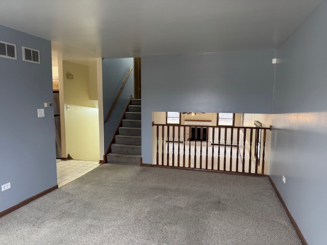910 East 152nd Place Phoenix, IL 60426 - Photo 6 of 28 a view of a hallway with entryway