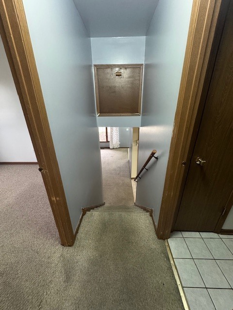 910 East 152nd Place Phoenix, IL 60426 - Photo 7 of 28 a view of a livingroom with a staircase