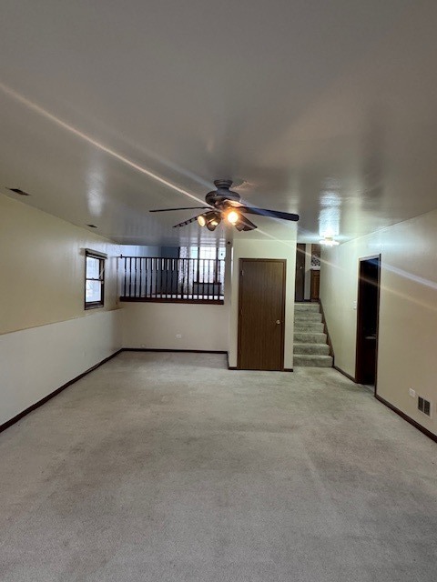 910 East 152nd Place Phoenix, IL 60426 - Photo 9 of 28 a view of an empty room with a window