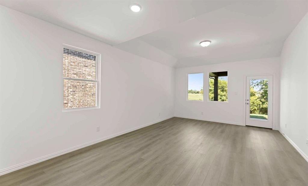 14166 Gallatin Street Pilot Point, TX 76258 - Photo 8 of 13 Open Living-Dining Room Representative Photo