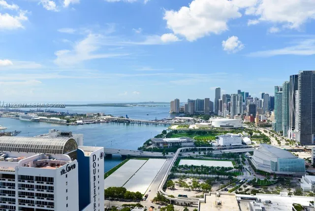 a view of a building with a yard