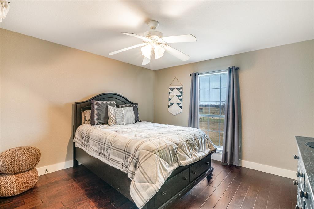 19930 County Road 324 Terrell, TX 75160 - Photo 27 of 40 a bedroom with a bed and window