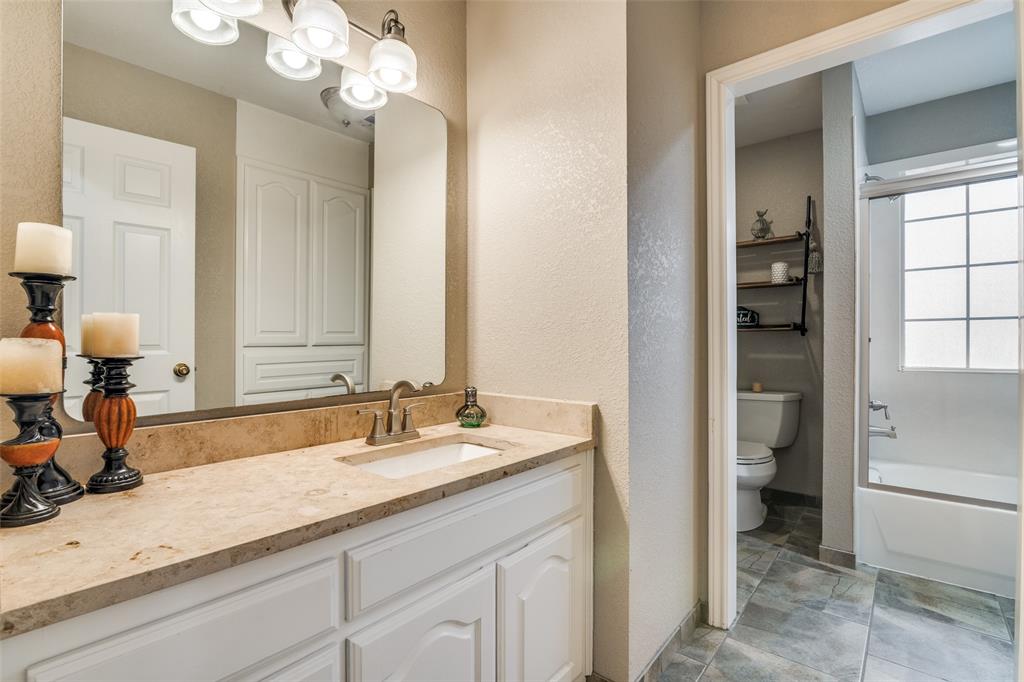 19930 County Road 324 Terrell, TX 75160 - Photo 30 of 40 a bathroom with a sink vanity and a mirror