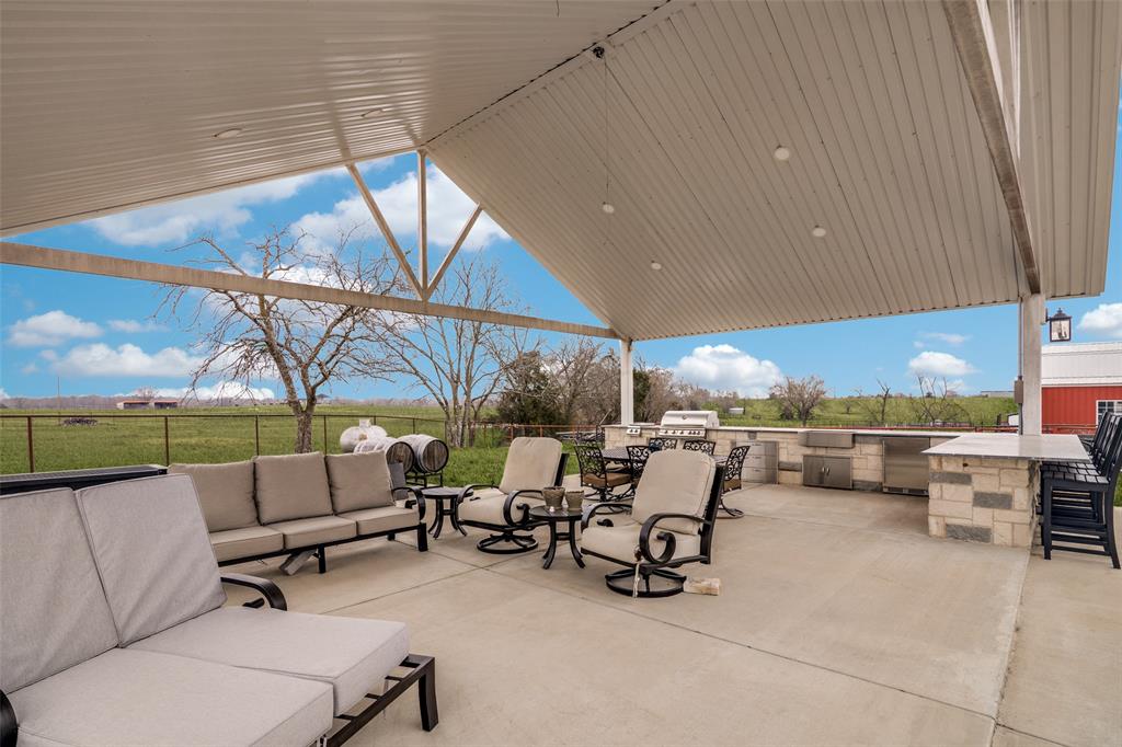 19930 County Road 324 Terrell, TX 75160 - Photo 32 of 40 a building outdoor space with patio furniture and potted plants