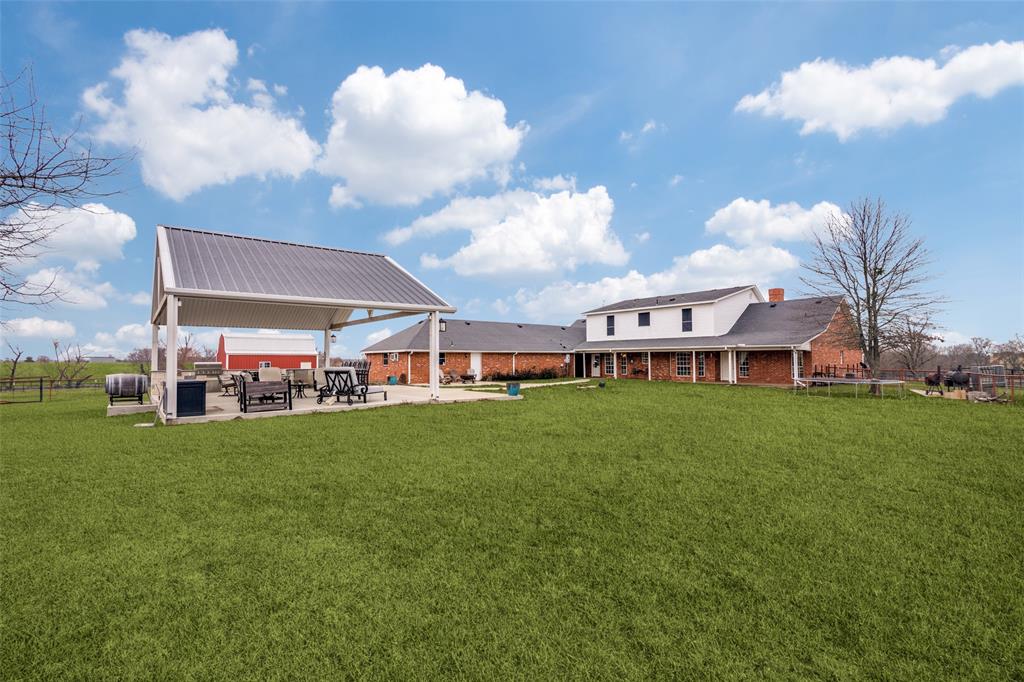 19930 County Road 324 Terrell, TX 75160 - Photo 34 of 40 a view of a house with a big yard