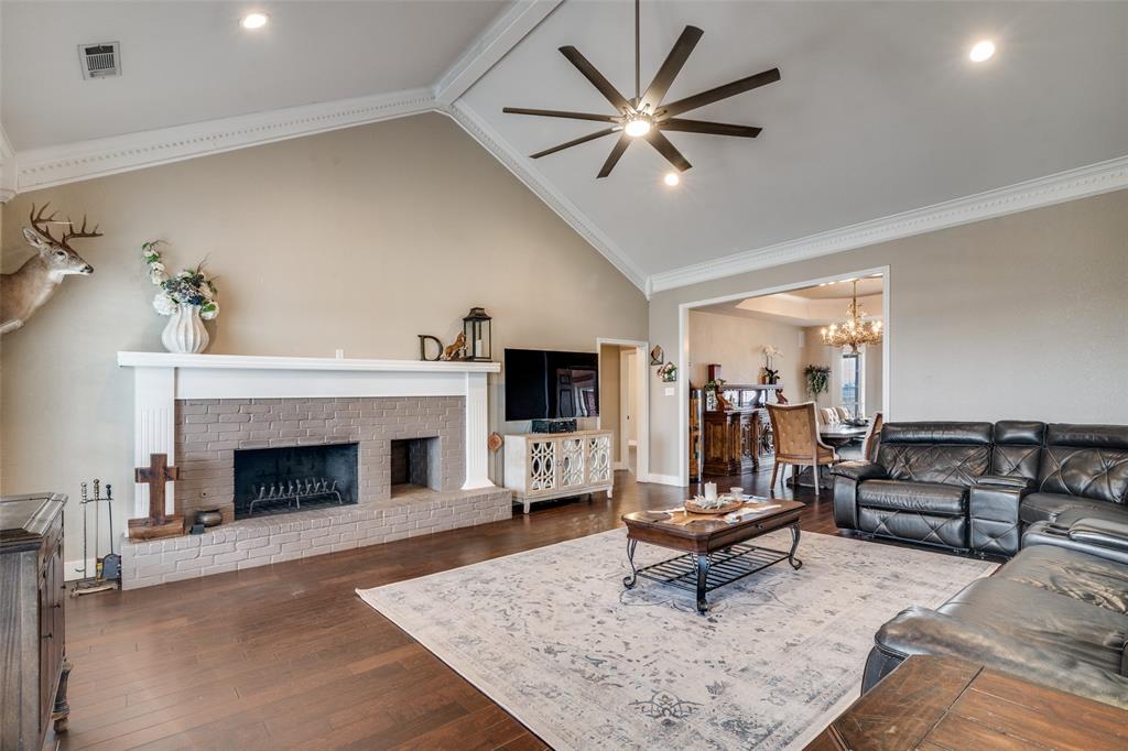 19930 County Road 324 Terrell, TX 75160 - Photo 5 of 40 a living room with furniture and a fireplace