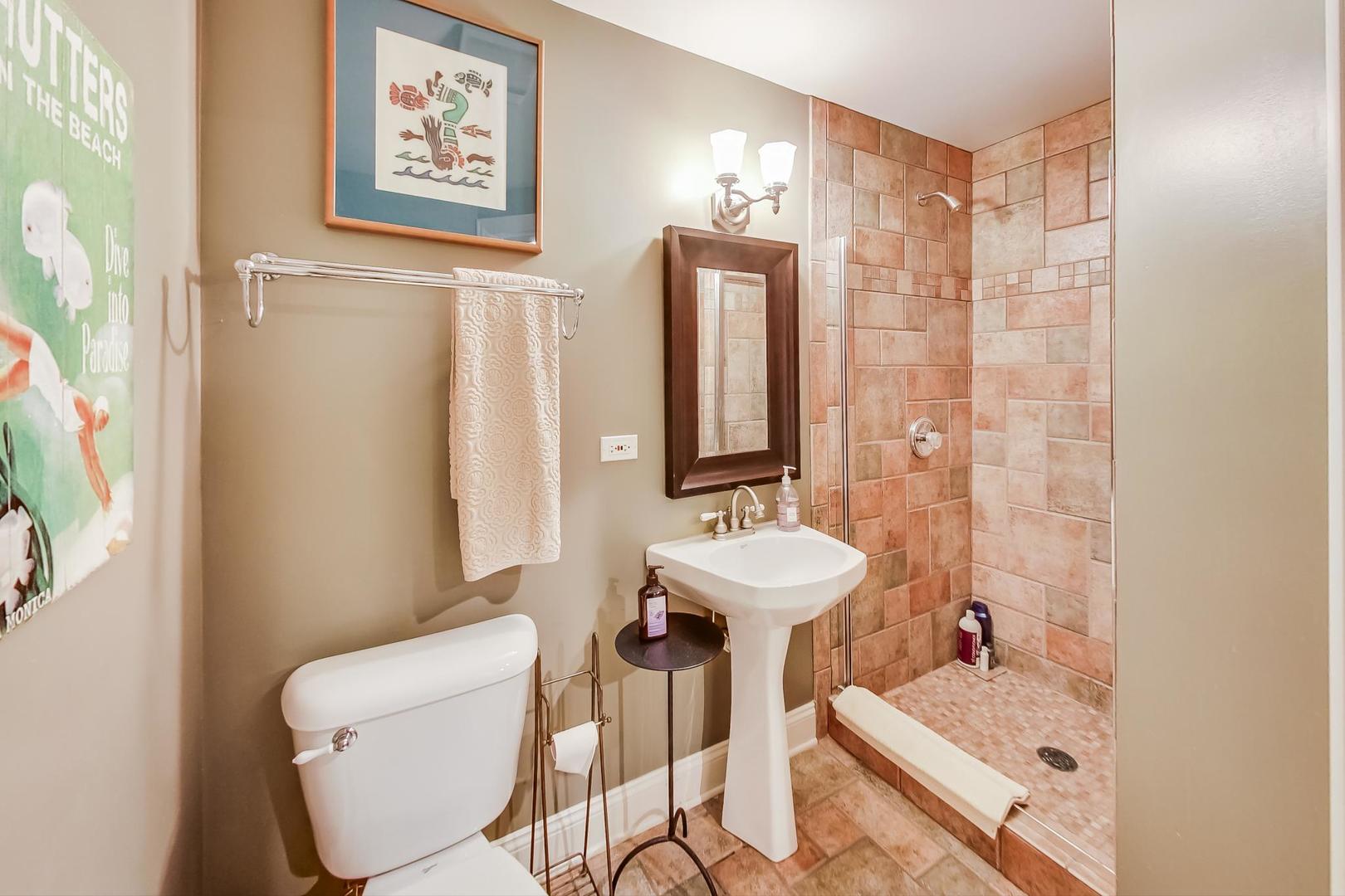 32 Crescent Place Wilmette, IL 60091 - Photo 31 of 45 a bathroom with a sink toilet and shower