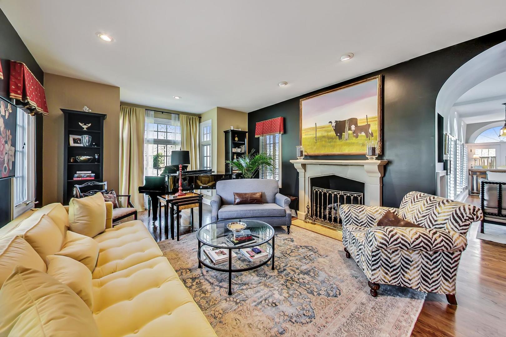 32 Crescent Place Wilmette, IL 60091 - Photo 5 of 45 a living room with furniture fireplace and a flat screen tv