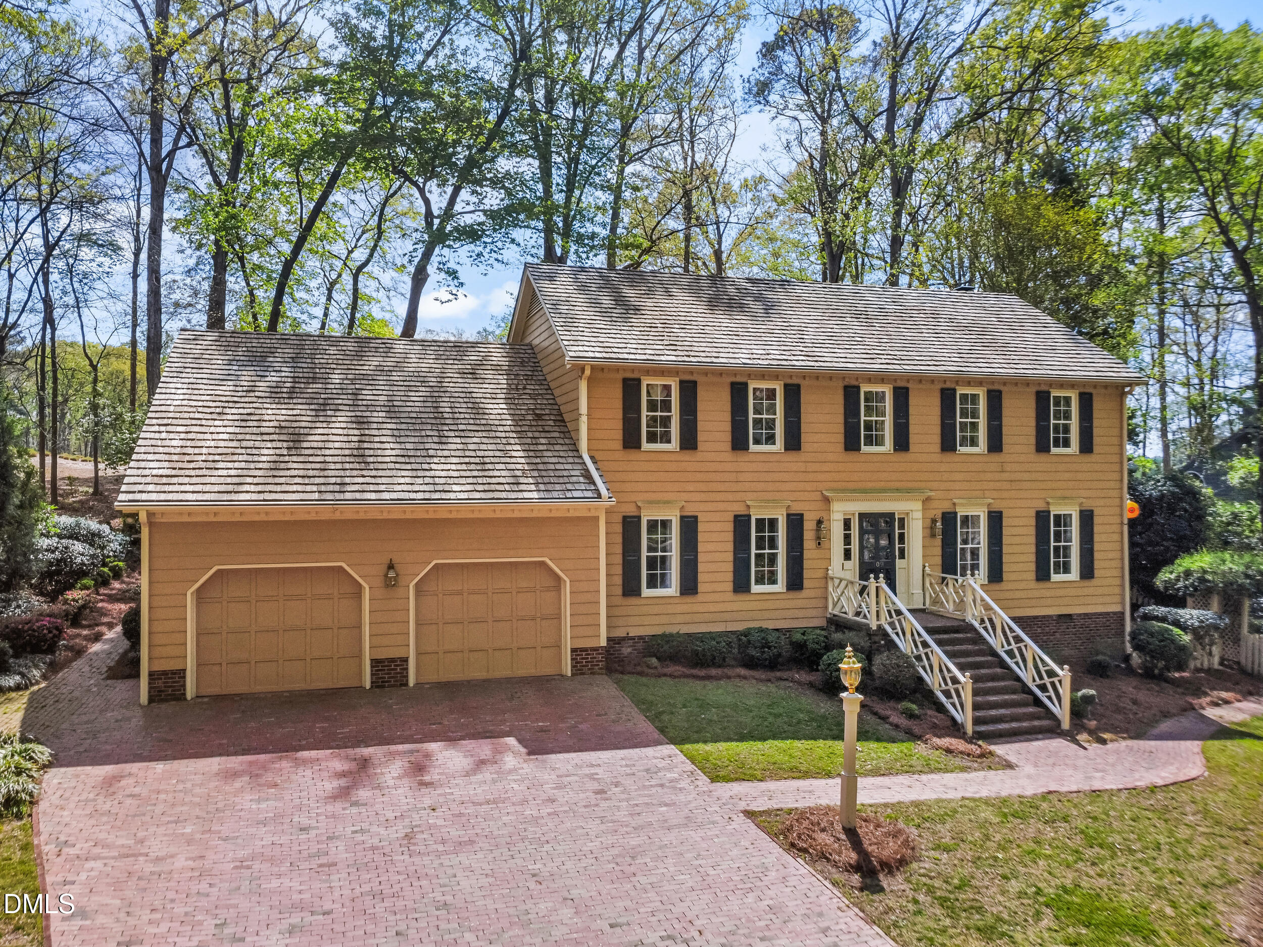 109 Queensferry Road Cary, NC 27511 - Photo 1 of 48 a front view of a house with a yard
