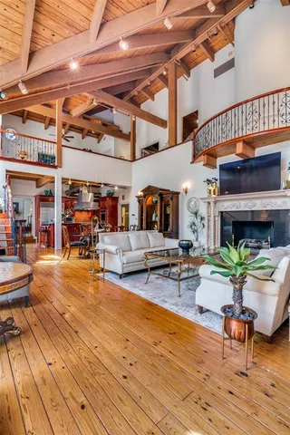 a living room with furniture and a table