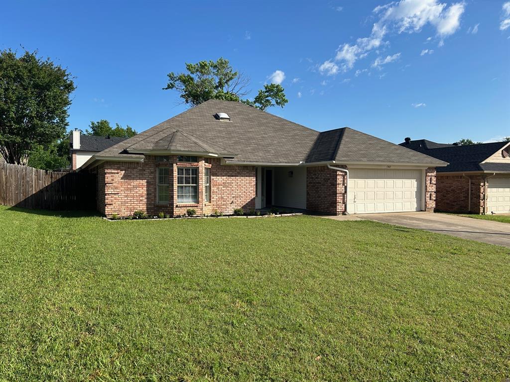 1507 Lincoln Road Mansfield, TX 76063 - Photo 1 of 1 a front view of a house with a garden