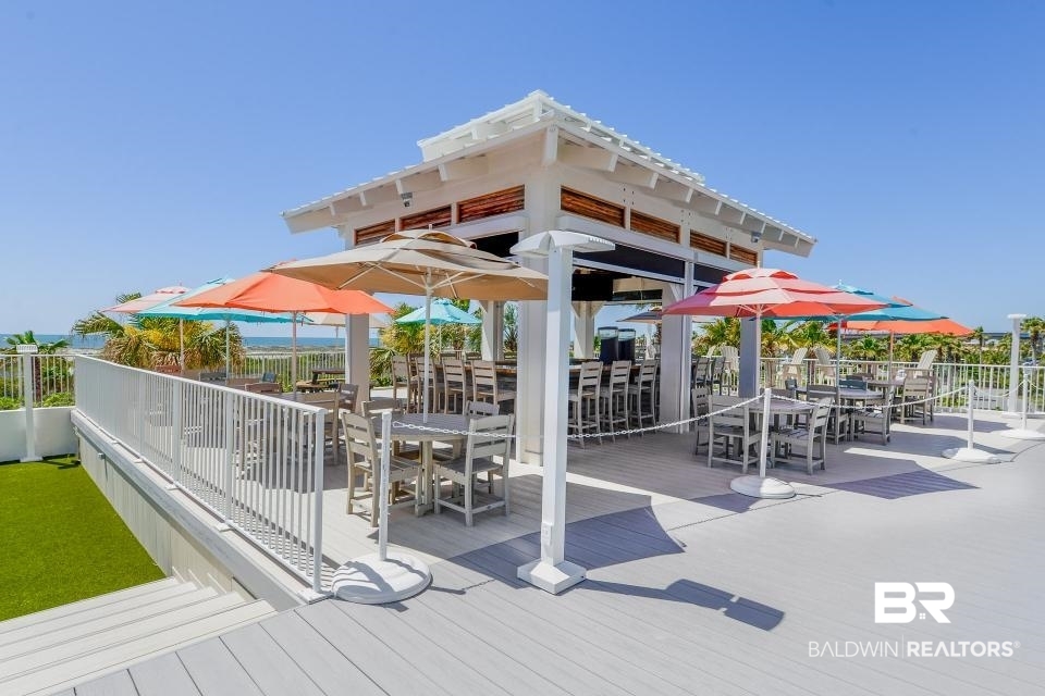 28107 Perdido Beach Boulevard, Unit DPH05 Orange Beach, AL 36561 - Photo 32 of 43 View of patio / terrace featuring outdoor dining space and a rooftop deck
